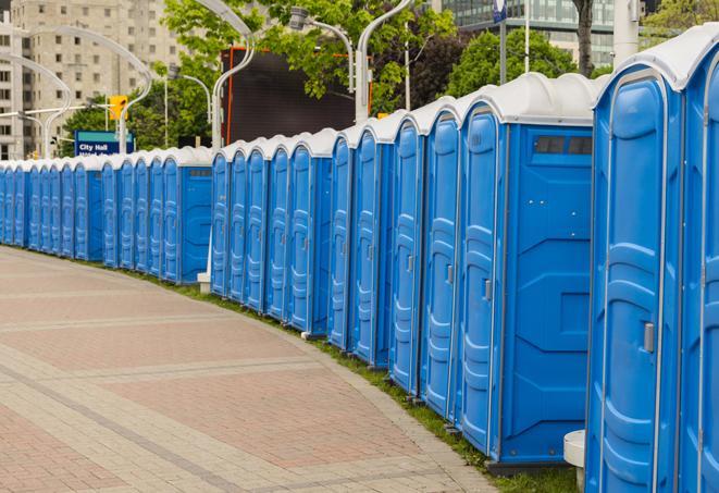 a line of portable restrooms at a sporting event, providing athletes and spectators with clean and accessible facilities in Anaheim